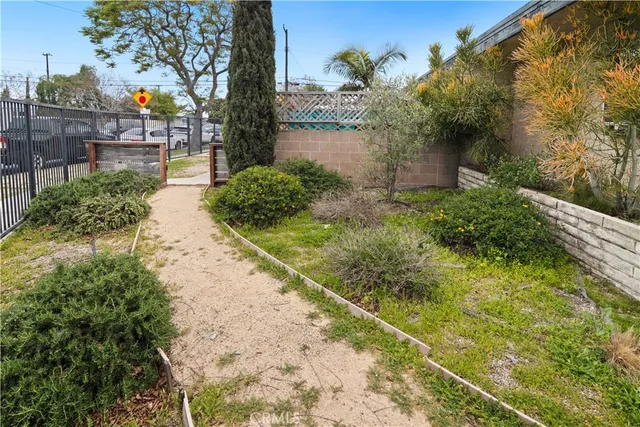 a view of a garden with pathway