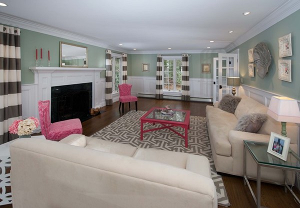 81 Carisbrooke Road Wellesley, MA 02481 - Photo 15 of 20 a living room with furniture and a fireplace