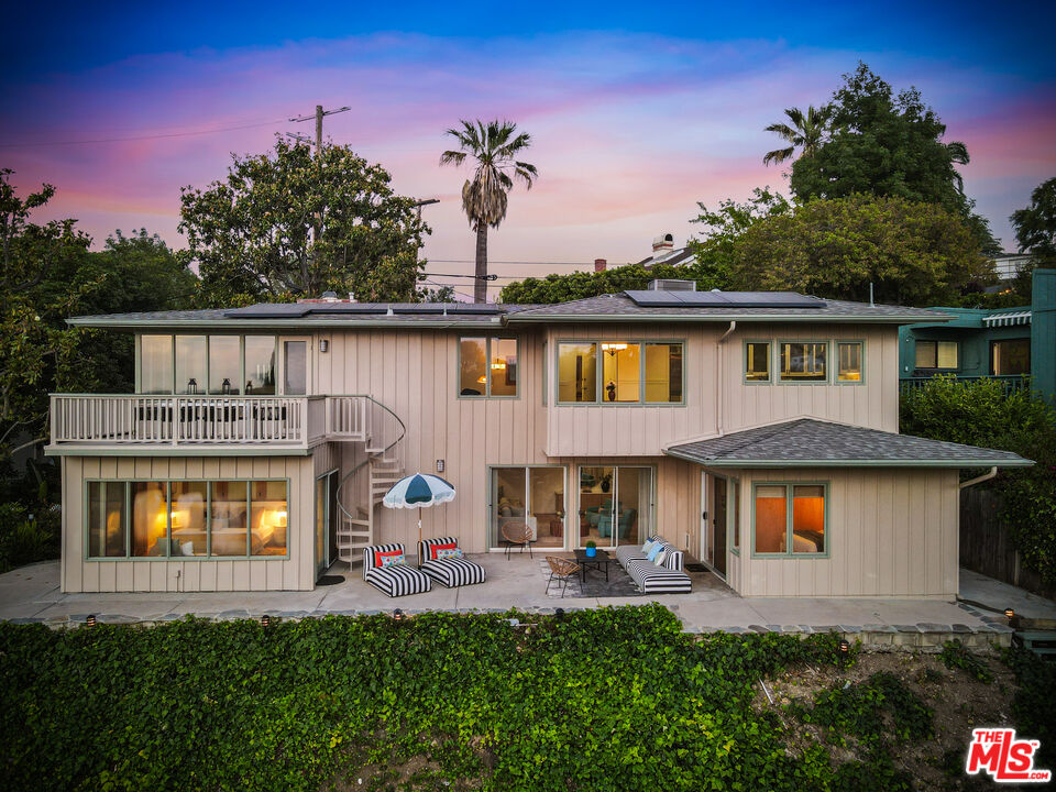 13201 Cheltenham Drive Sherman Oaks, CA 91423 - Photo 1 of 75 a front view of house with yard and outdoor seating