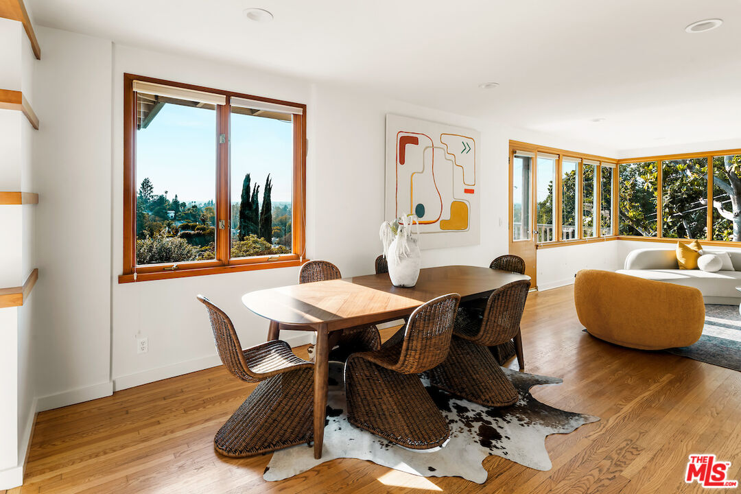 13201 Cheltenham Drive Sherman Oaks, CA 91423 - Photo 11 of 75 a living room with furniture and a large window