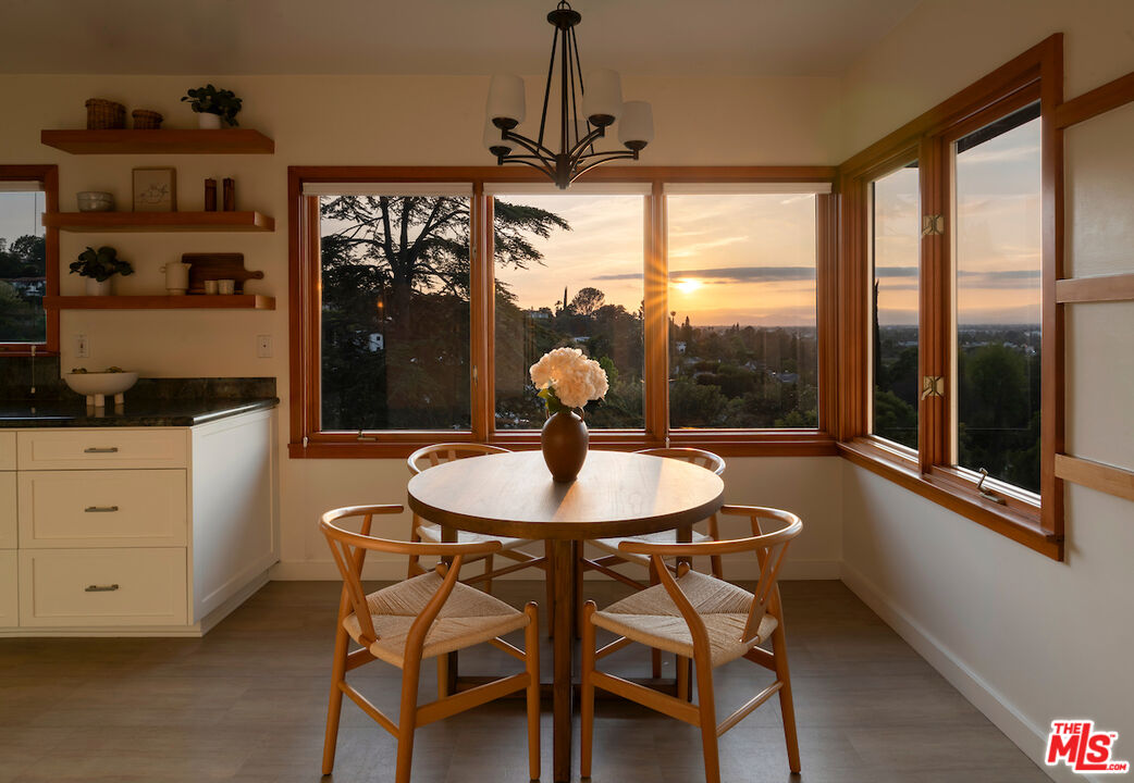 13201 Cheltenham Drive Sherman Oaks, CA 91423 - Photo 18 of 75 a dining room with furniture and window