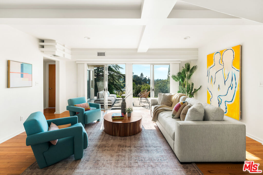 13201 Cheltenham Drive Sherman Oaks, CA 91423 - Photo 33 of 75 a living room with furniture and a large window
