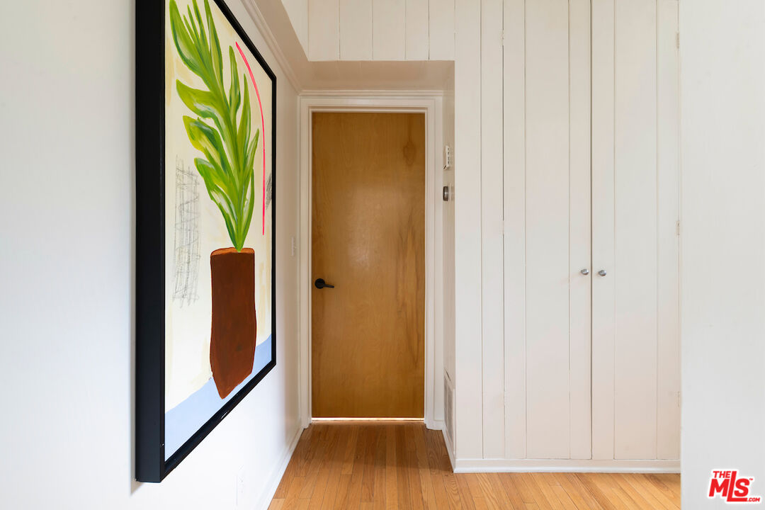 13201 Cheltenham Drive Sherman Oaks, CA 91423 - Photo 34 of 75 a view of front door with wooden floor