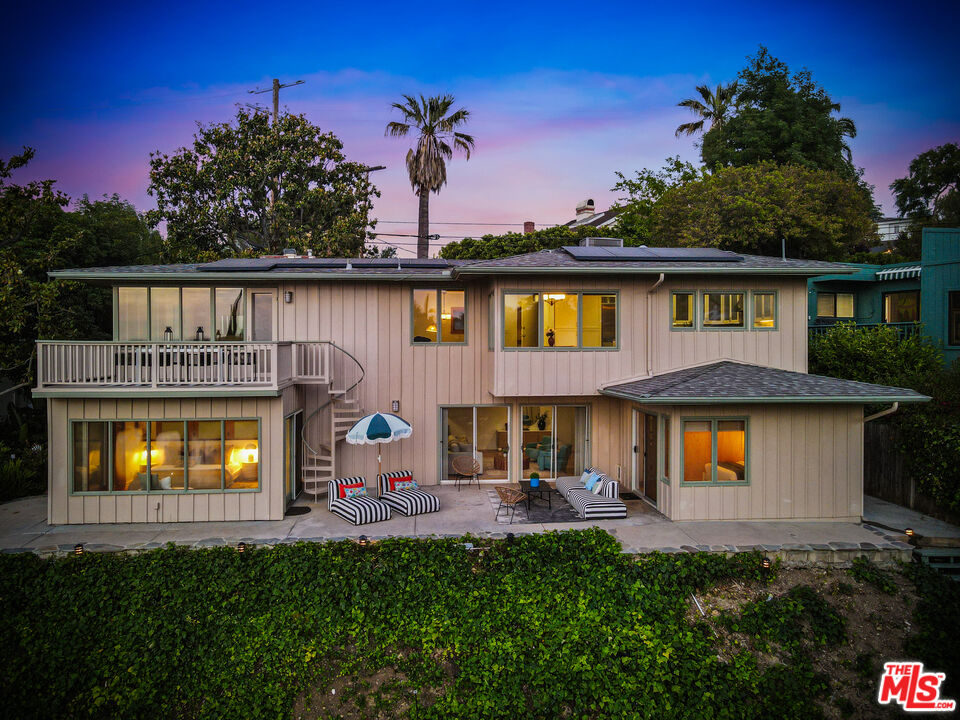 13201 Cheltenham Drive Sherman Oaks, CA 91423 - Photo 71 of 75 a front view of a house with a yard