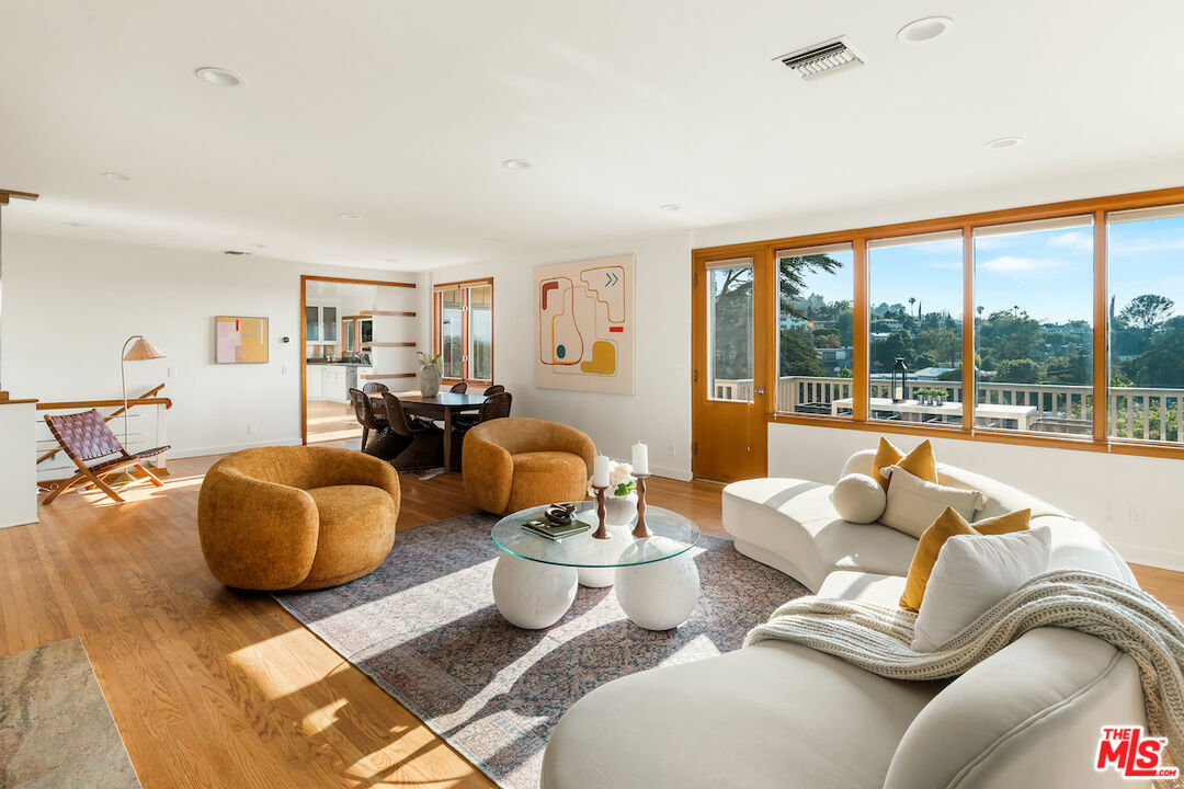 13201 Cheltenham Drive Sherman Oaks, CA 91423 - Photo 9 of 75 a living room with furniture and a large window