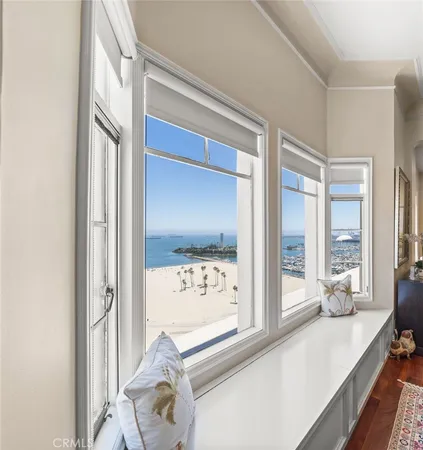 view of living room with furniture and large window