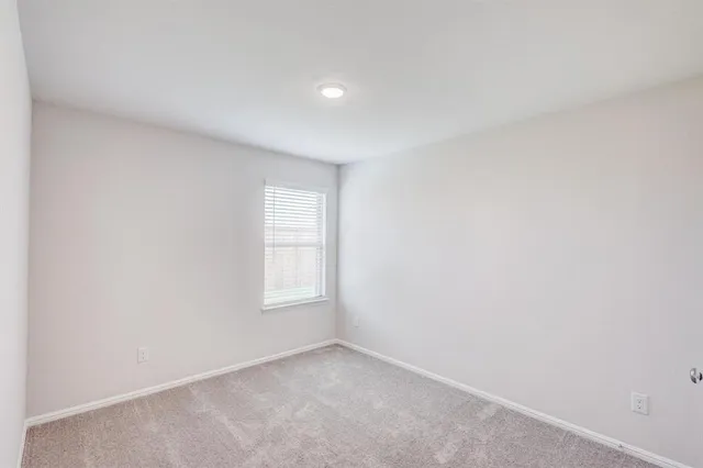 a bathroom with a sink and shower