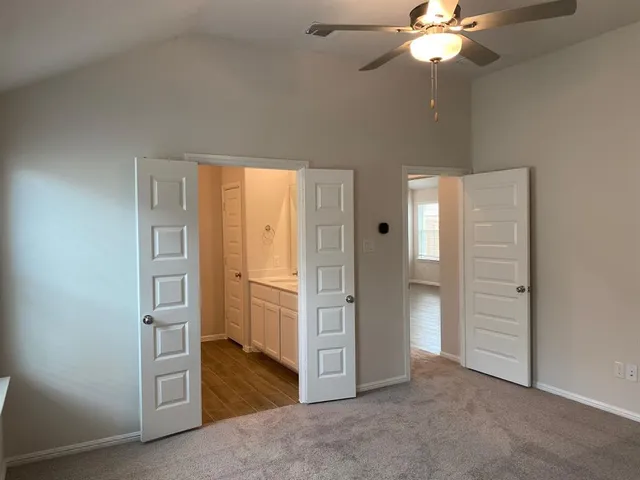 a kitchen with granite countertop a sink and a stove