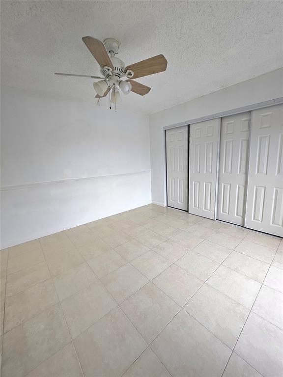 912 Springdale Circle, Unit 912 Palm Springs, FL 33461 - Photo 11 of 15 a view of an empty room