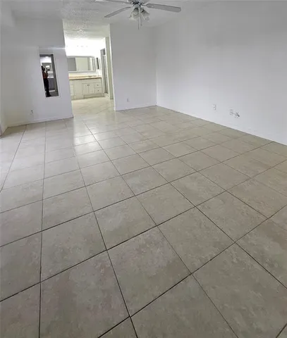 a view of a livingroom and window