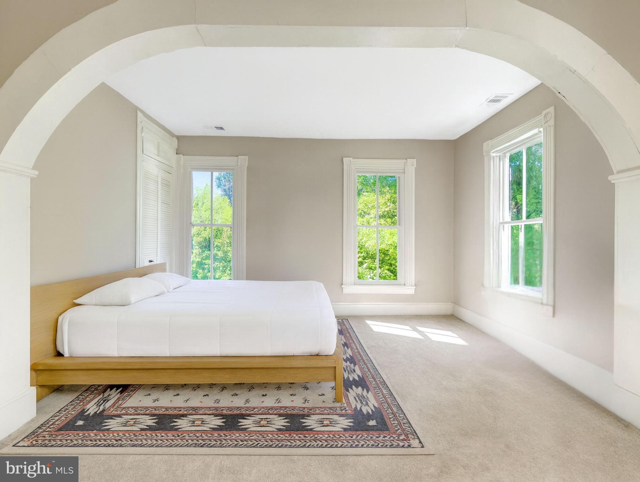 39 New Cut Road Round Hill, VA 20141 - Photo 11 of 33 a bed sitting in a spacious bedroom next to a window