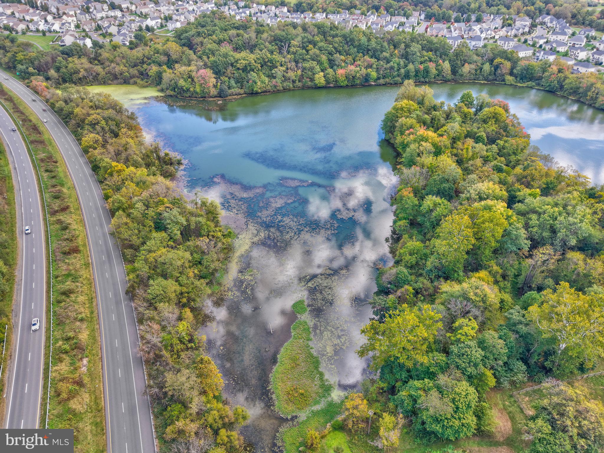39 New Cut Road Round Hill, VA 20141 - Photo 25 of 33 a view of a lake with a mountain and a lake view