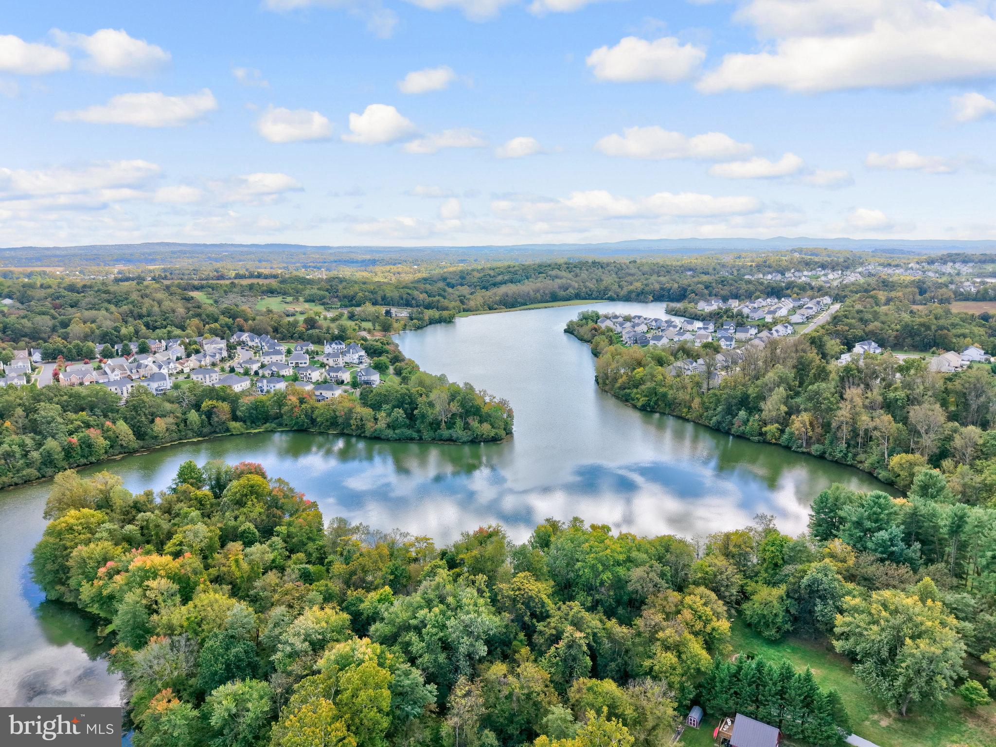 39 New Cut Road Round Hill, VA 20141 - Photo 26 of 33 an aerial view of residential houses with outdoor space and lake view