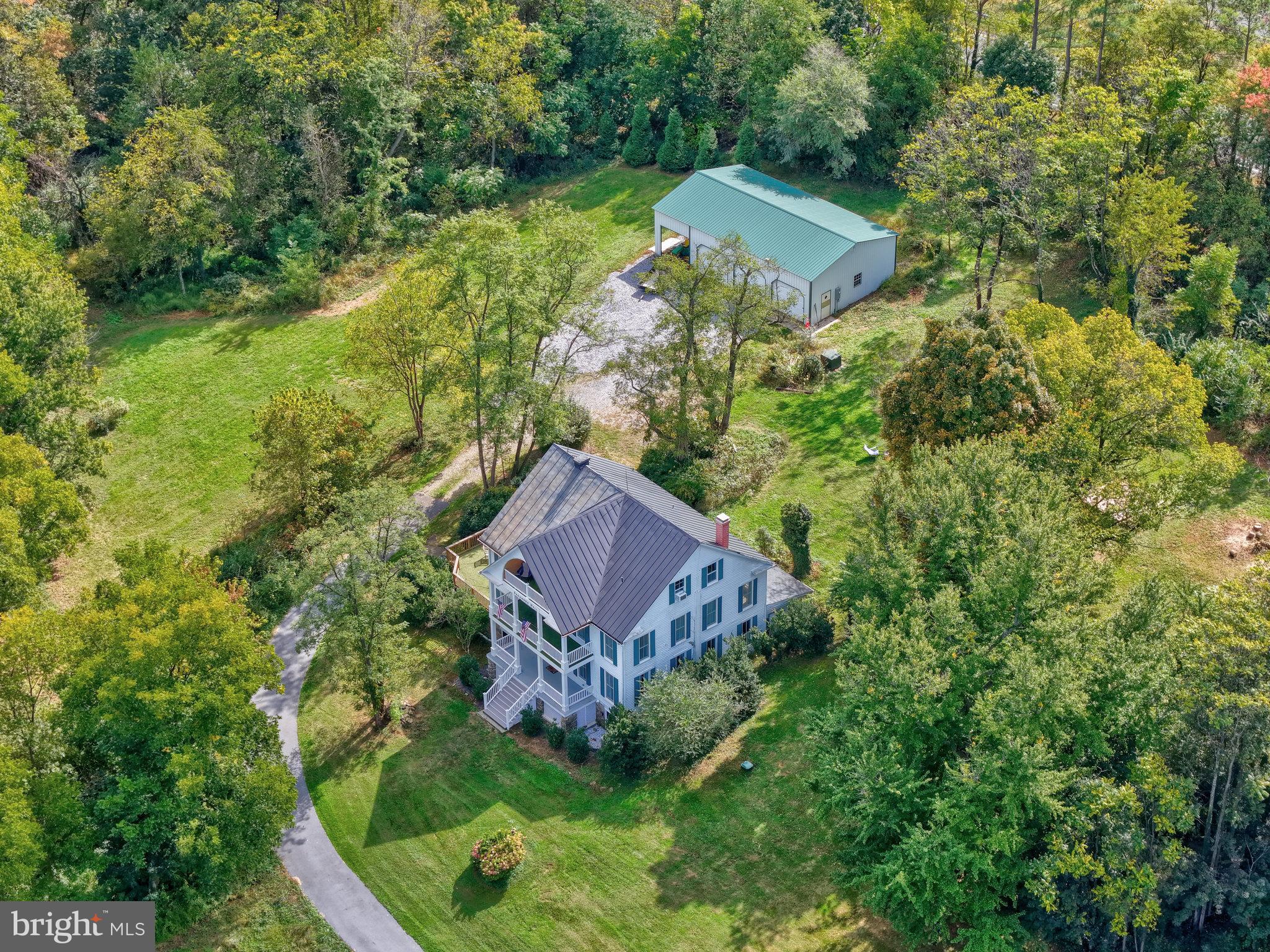39 New Cut Road Round Hill, VA 20141 - Photo 31 of 33 an aerial view of a house with a yard