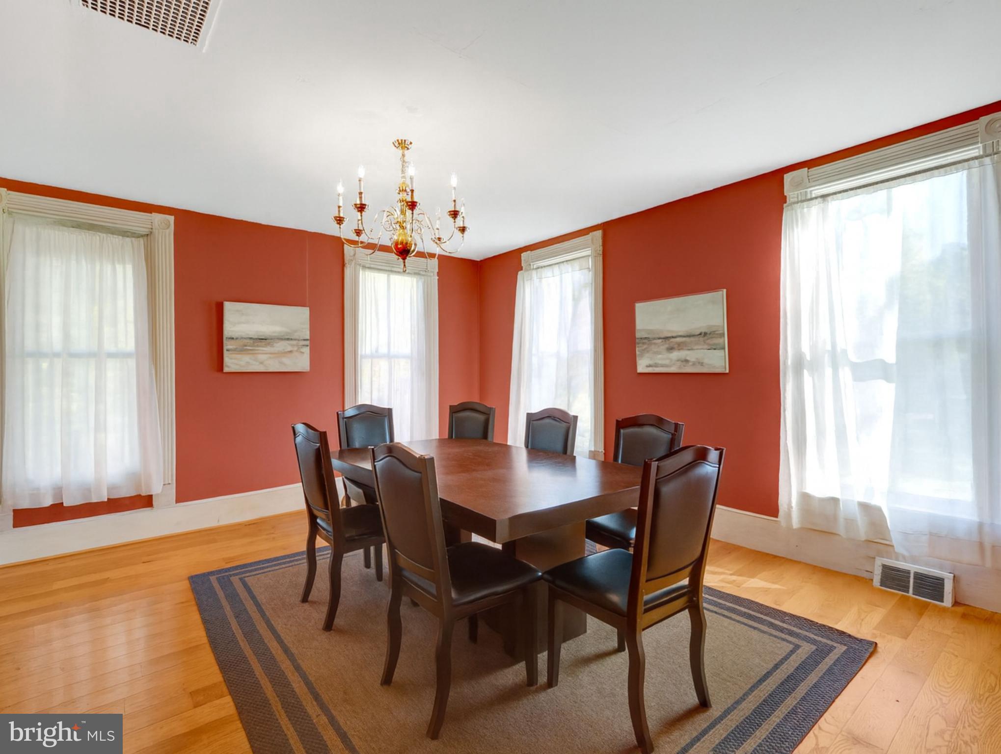 39 New Cut Road Round Hill, VA 20141 - Photo 7 of 33 a view of a dining room with furniture window and wooden floor