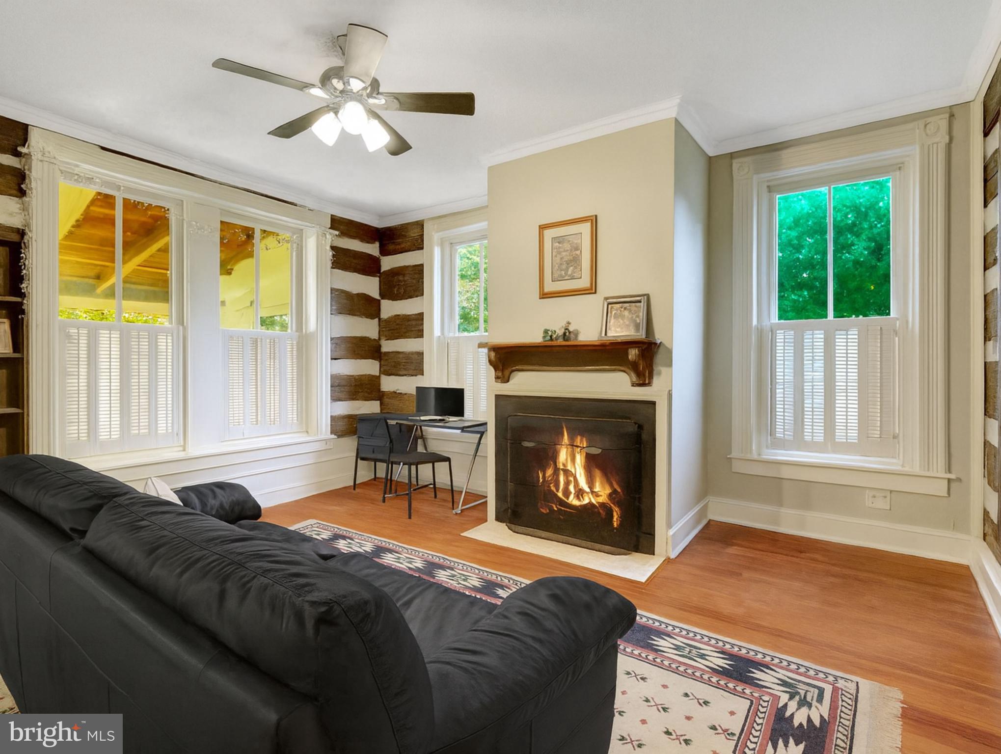39 New Cut Road Round Hill, VA 20141 - Photo 8 of 33 a living room with furniture and a fireplace