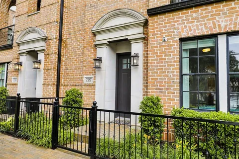 a view of city with tall buildings