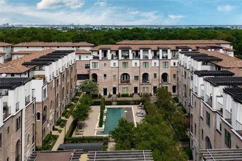 a view of a city with tall buildings