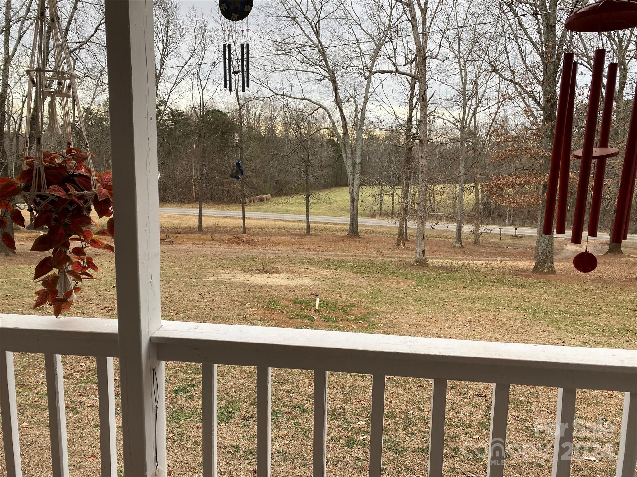 1715 Hopewell Church Road Hiddenite, NC 28636 - Photo 19 of 46 a view of a porch