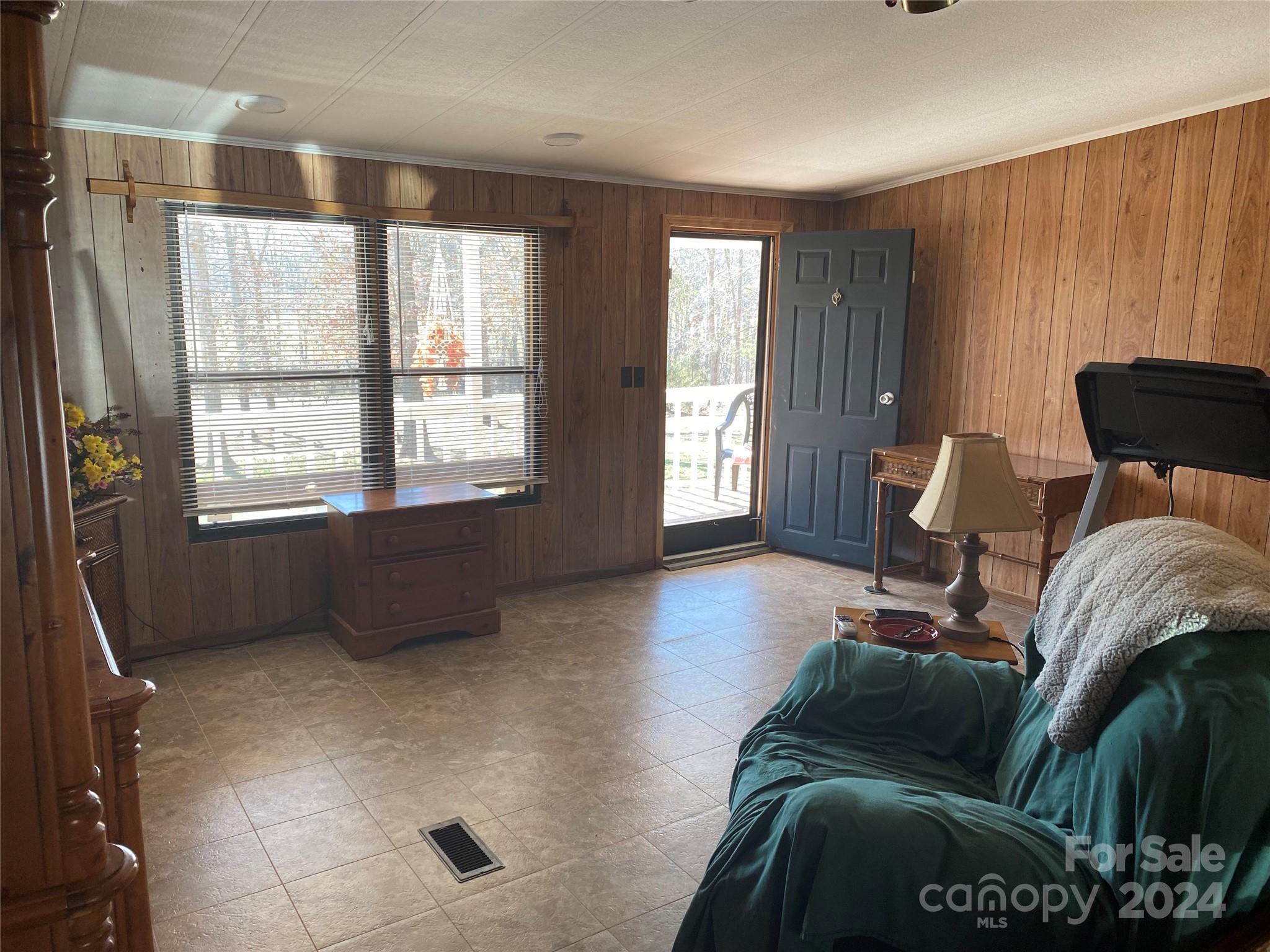 1715 Hopewell Church Road Hiddenite, NC 28636 - Photo 33 of 46 a living room with furniture and a window