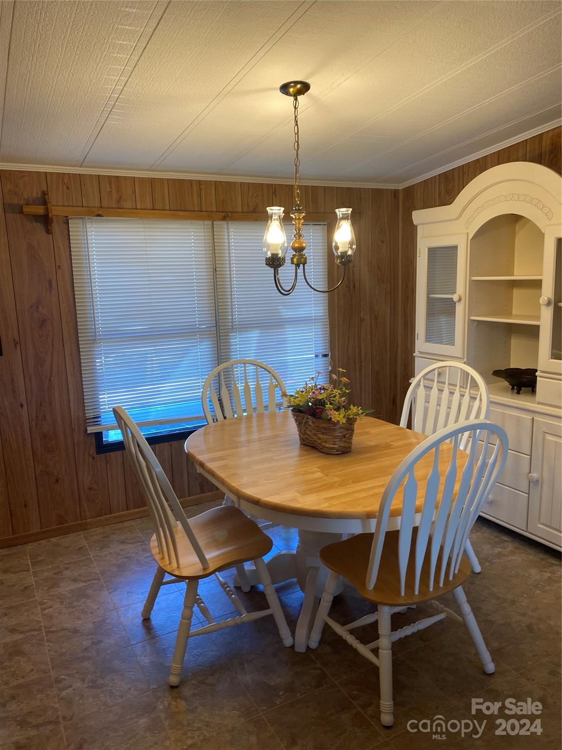 1715 Hopewell Church Road Hiddenite, NC 28636 - Photo 36 of 46 a view of a dining room with furniture and wooden floor