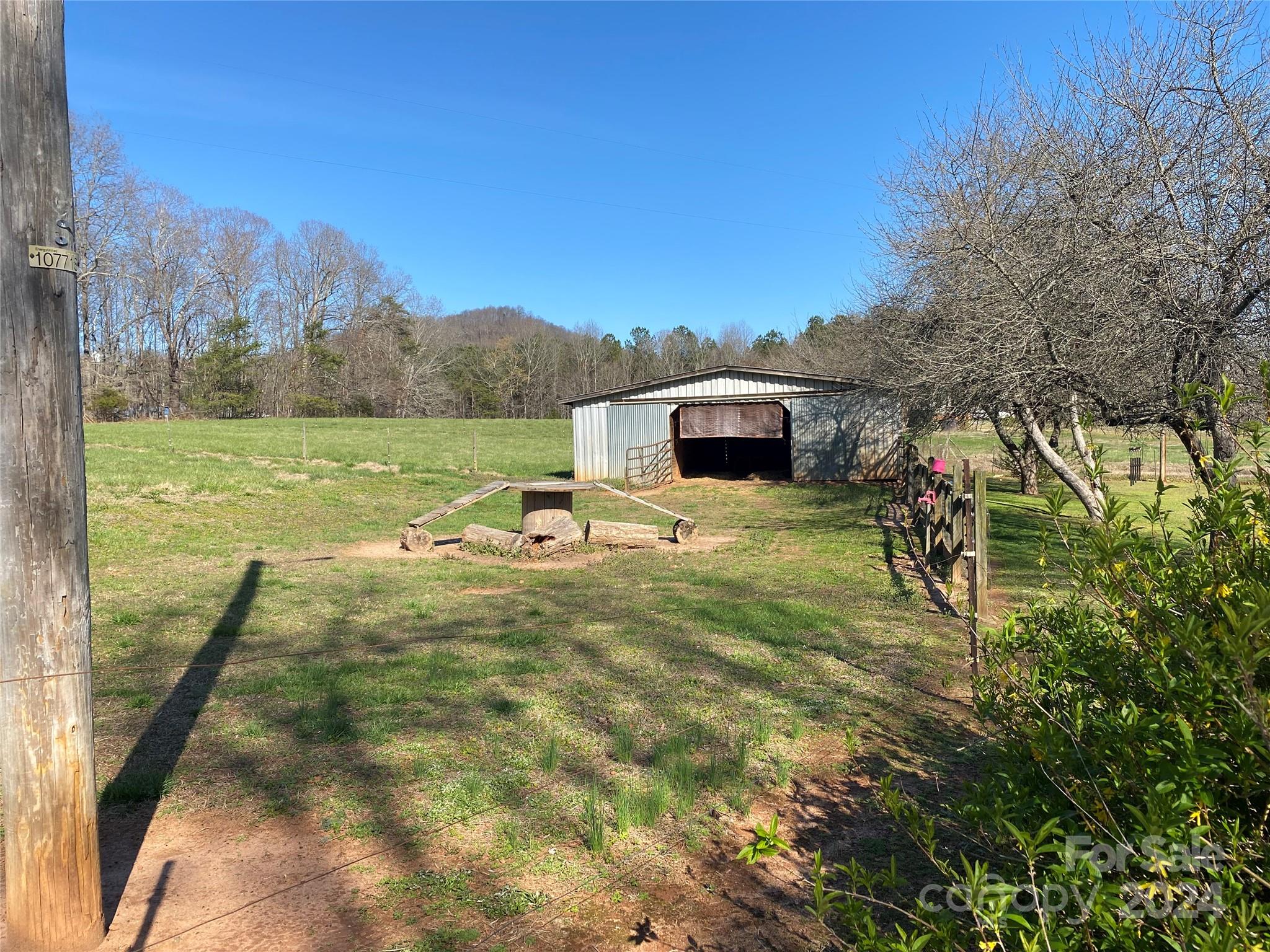 1715 Hopewell Church Road Hiddenite, NC 28636 - Photo 41 of 46 a view of a yard with an outdoor space