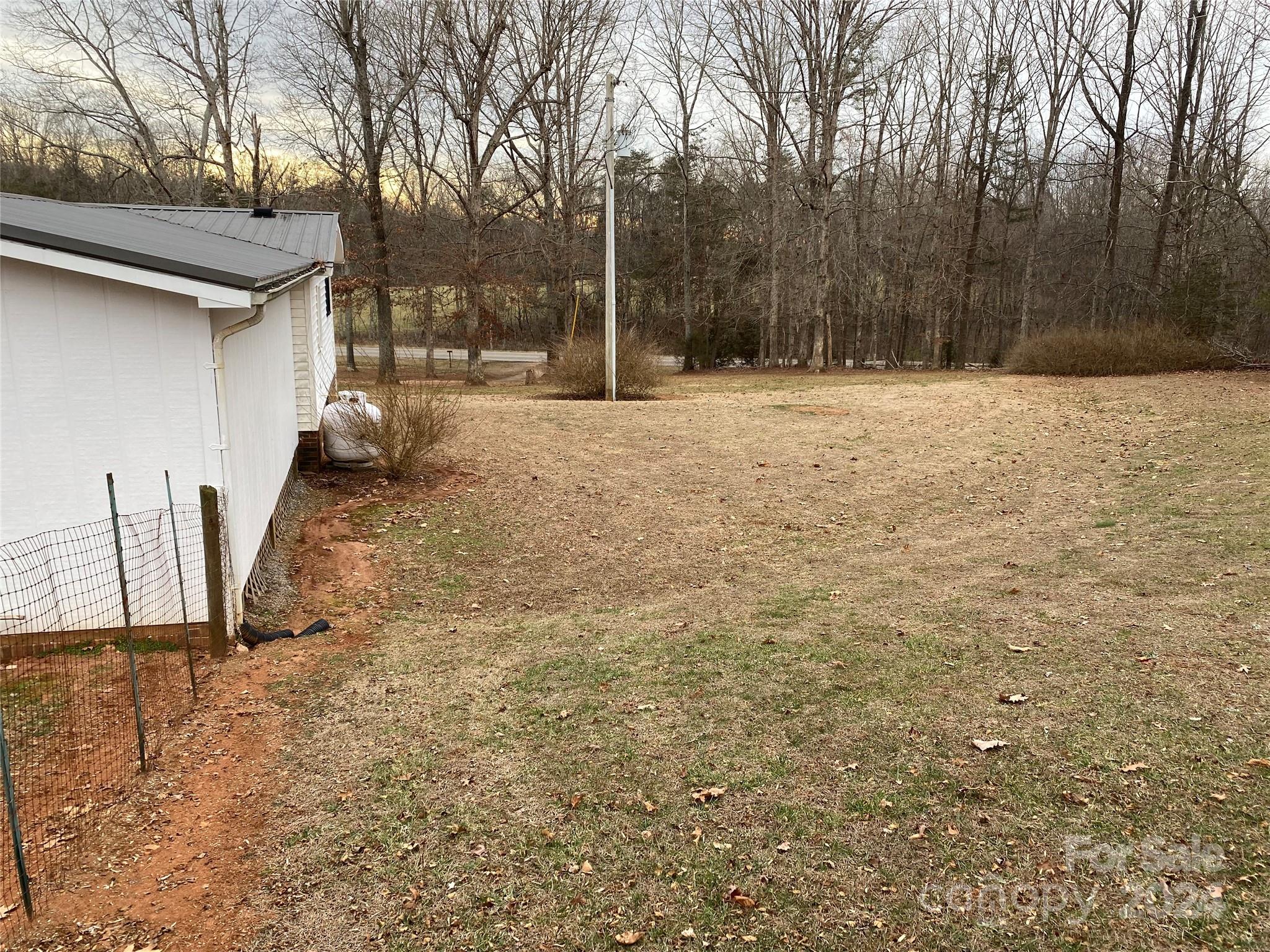 1715 Hopewell Church Road Hiddenite, NC 28636 - Photo 5 of 46 a outdoor space with trees