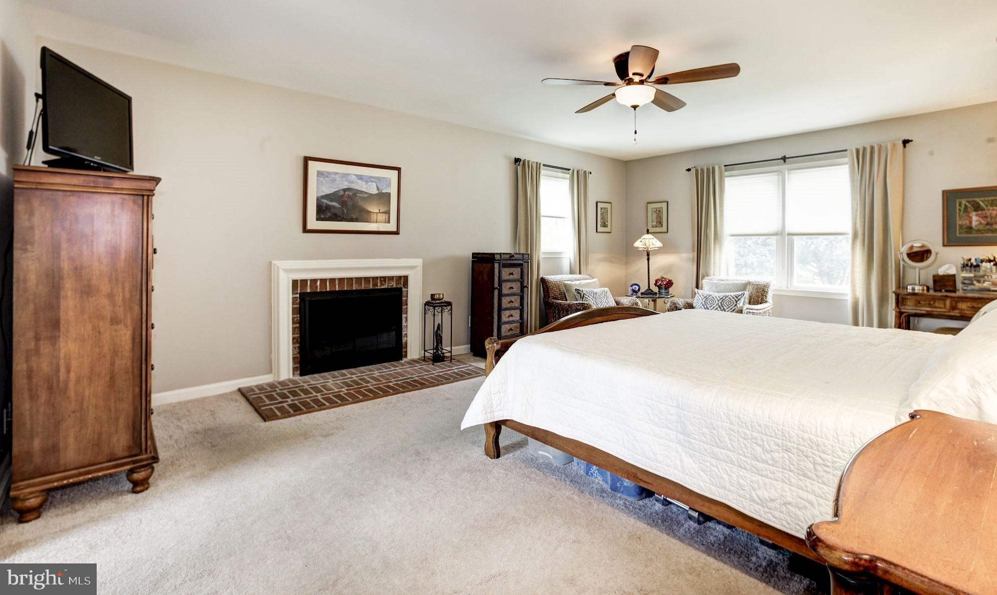 1607 Rolling Road Bel Air, MD 21014 - Photo 23 of 49 Master Bedroom with Wood-Burning Fireplace