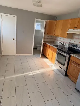 view of an empty room with a sink