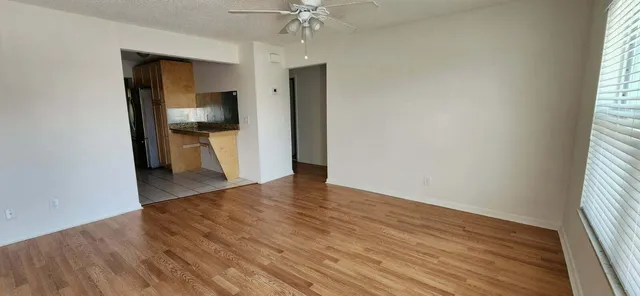 a view of a kitchen from the hallway