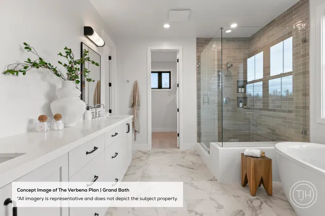 a spacious bathroom with a tub sink mirror and a shower