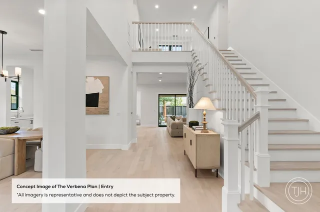 a view of a hallway with seating area