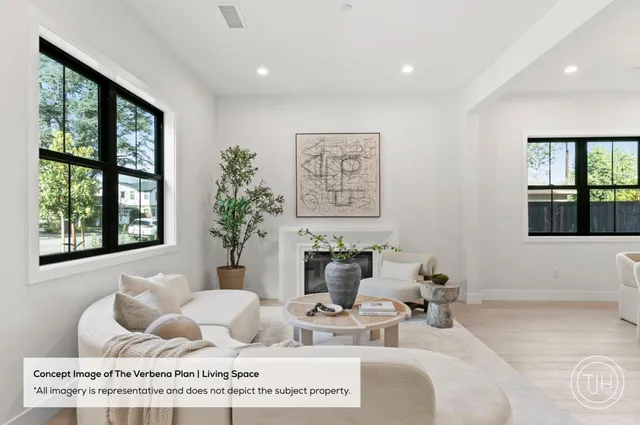 a living room with furniture and window