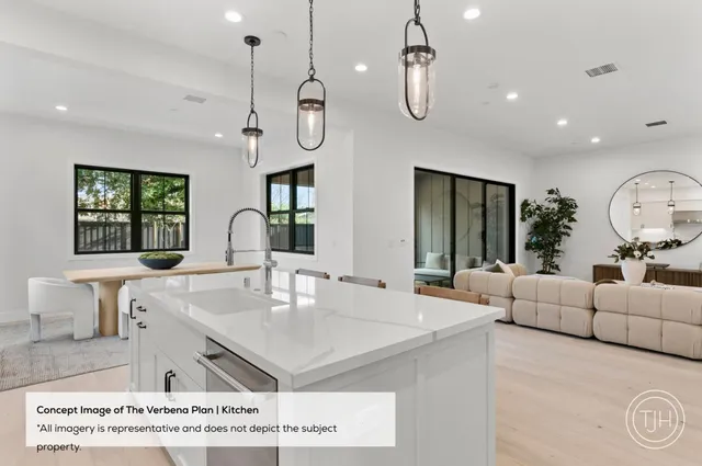 a view of a kitchen area with furniture and chandelier