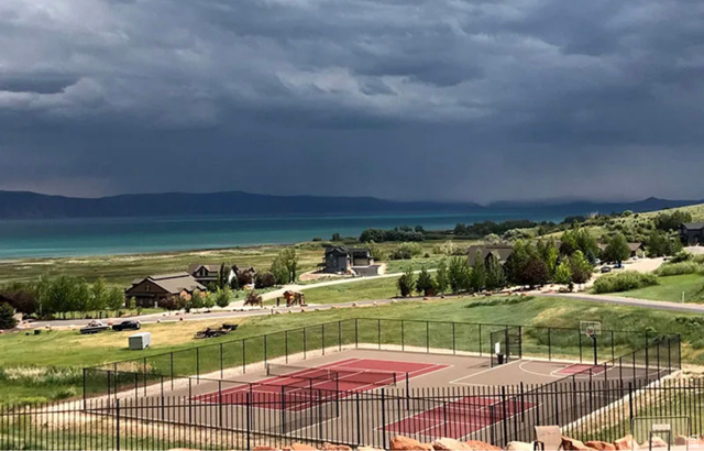 2 Summit, Unit 1 Fish Haven, ID 83287 - Photo 17 of 18 View of property's community with a water view and community basketball court