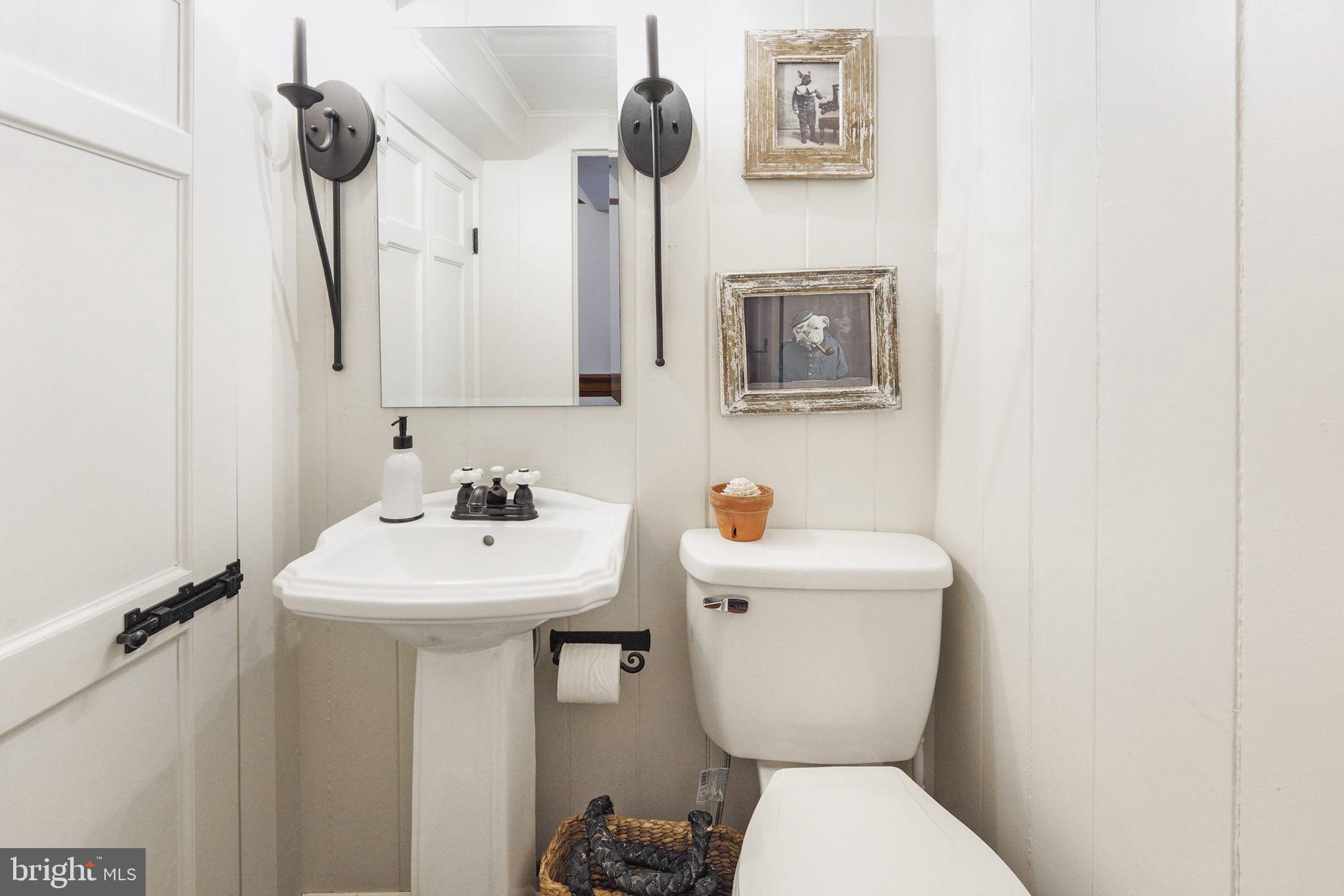 3427 Summit Point Road Summit Point, WV 25446 - Photo 18 of 102 Powder room under staircase
