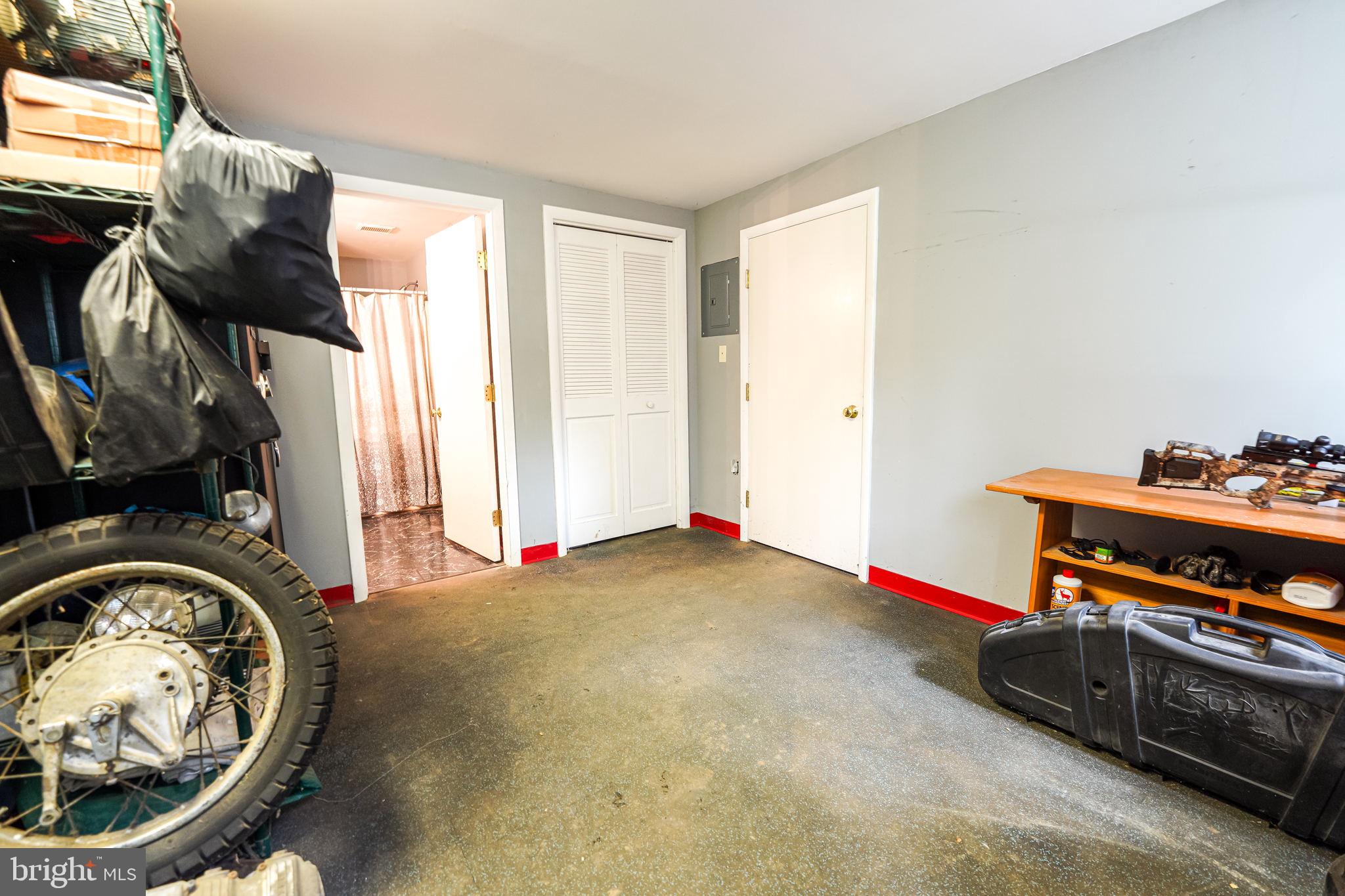 3427 Summit Point Road Summit Point, WV 25446 - Photo 65 of 102 Storage room behind garage + access to sauna