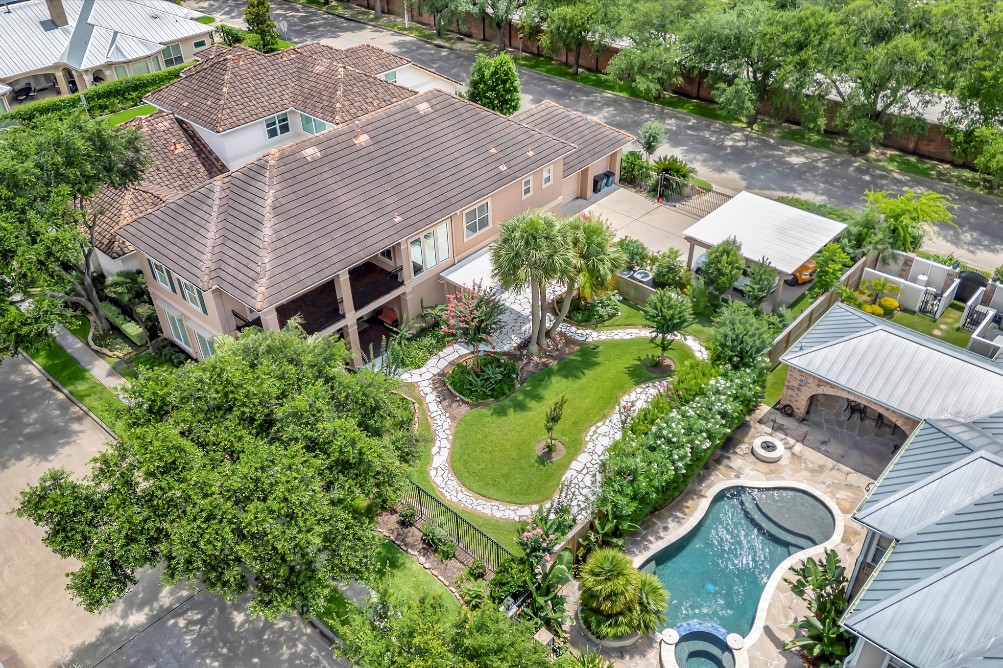 604 Harborside Way Kemah, TX 77565 - Photo 3 of 46 AERIAL VIEW HIGHLIGHTING THE RARE 1 1/2 LOT WITH GATED DRIVEWAY, WALKWAY WITH GARDENS, VERANDA AND BALCONY.