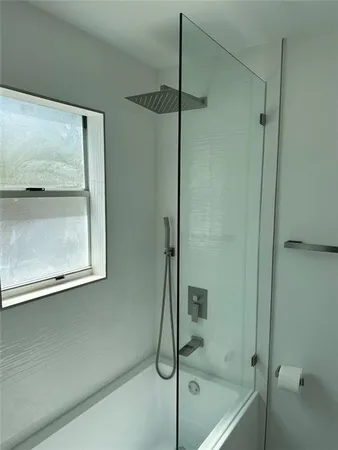 an aerial view of a house with a yard and garden