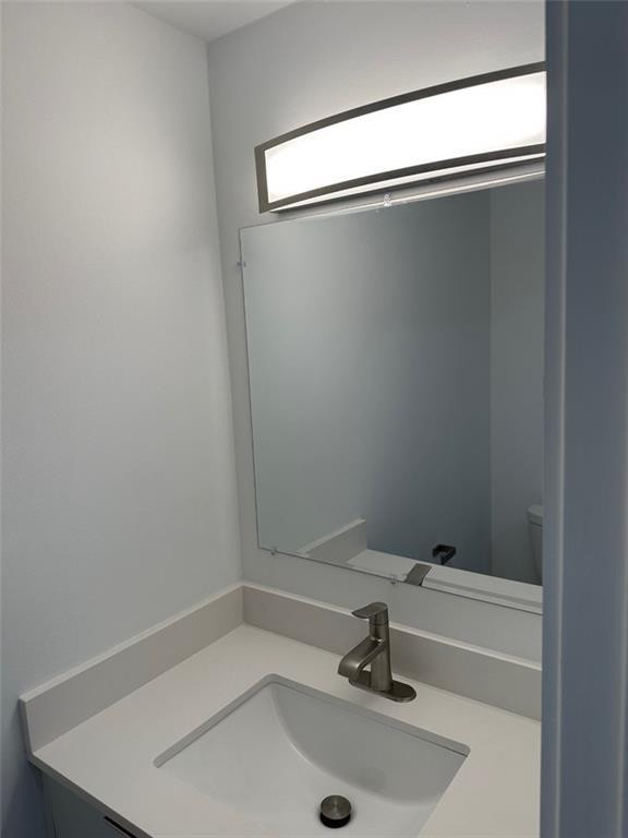 972 Jeffery Street Boca Raton, FL 33487 - Photo 7 of 18 a bathroom with a sink and mirror
