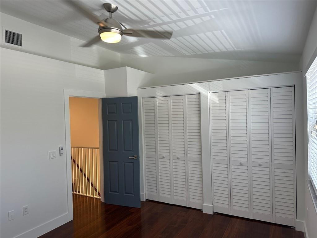 972 Jeffery Street Boca Raton, FL 33487 - Photo 9 of 18 a view of empty room with wooden floor