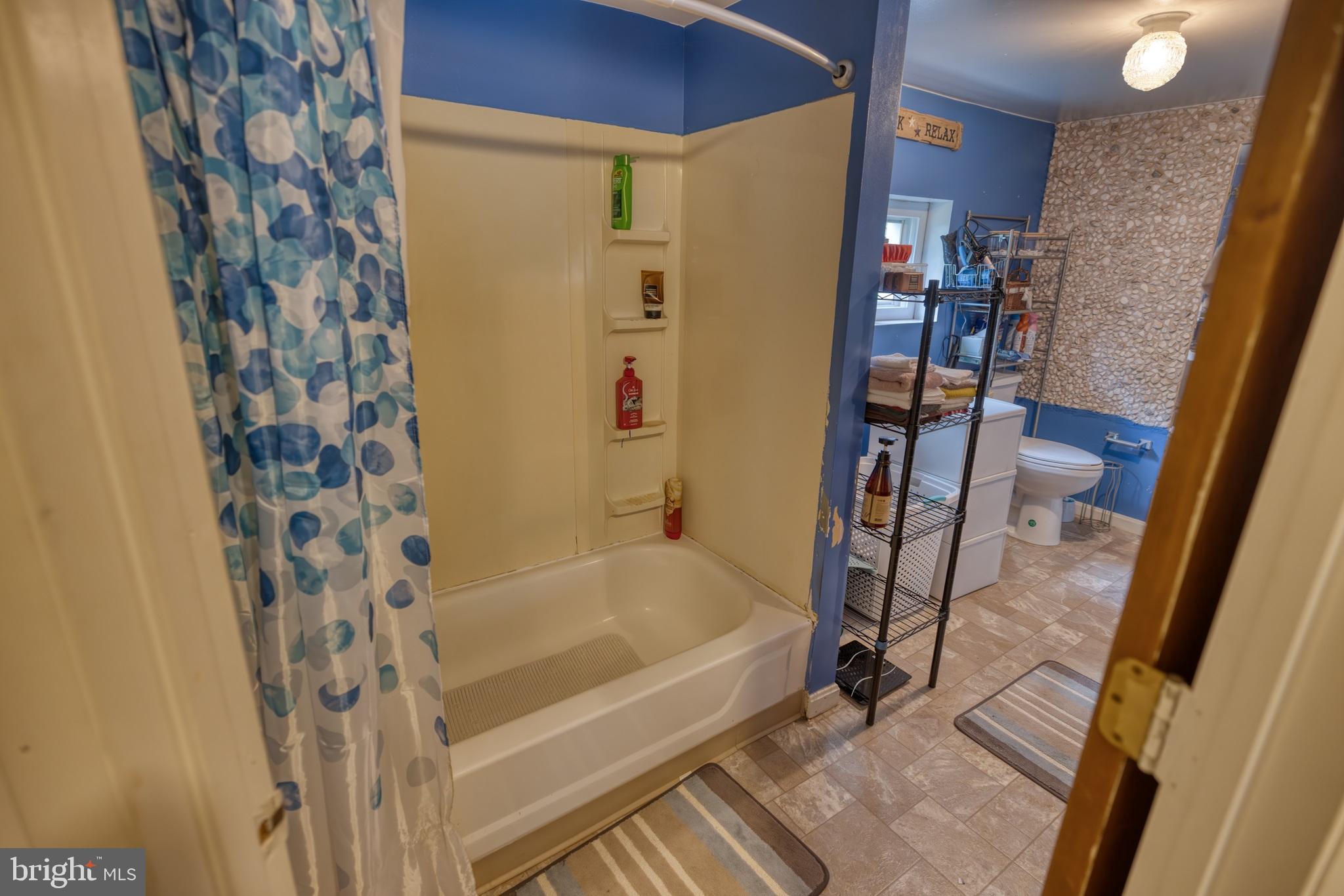 158 C Pleasant View Road Halifax, PA 17032 - Photo 11 of 59 a bathroom with a bathtub and a shower