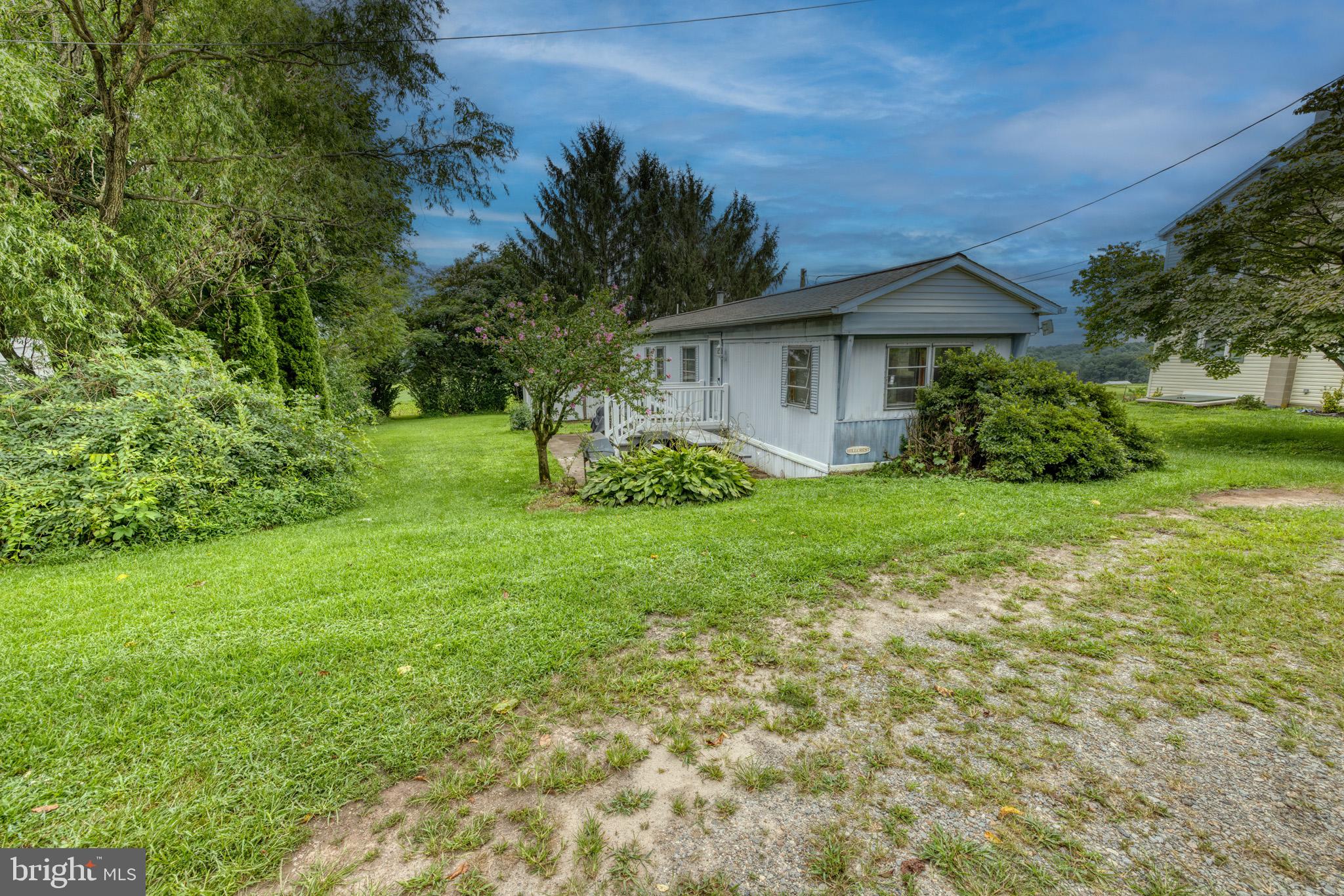 158 C Pleasant View Road Halifax, PA 17032 - Photo 17 of 59 a view of a house with yard and a garden