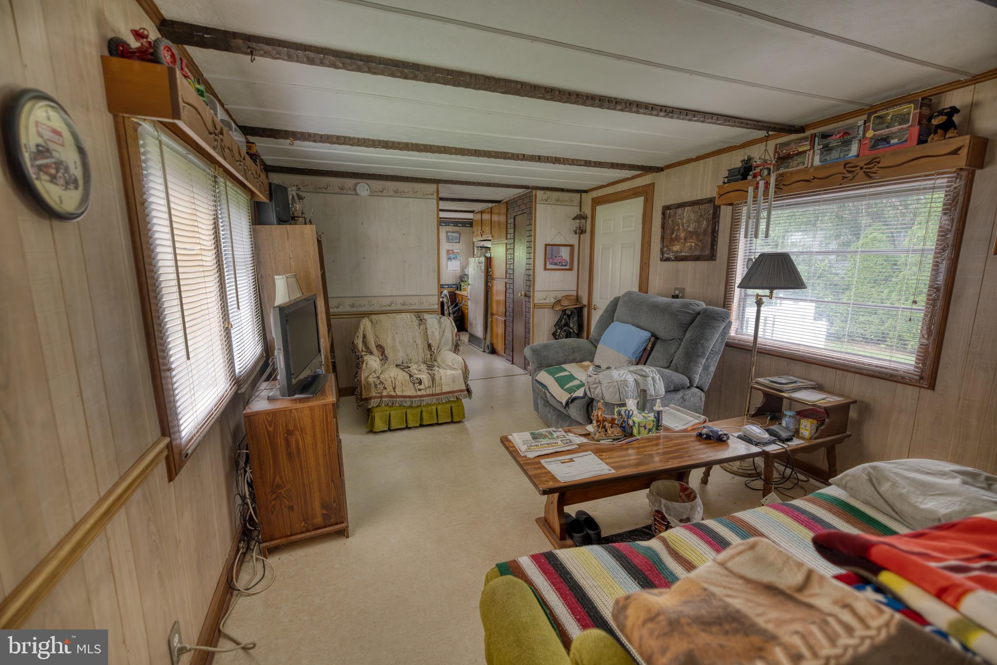 158 C Pleasant View Road Halifax, PA 17032 - Photo 20 of 59 a living room with furniture and a window