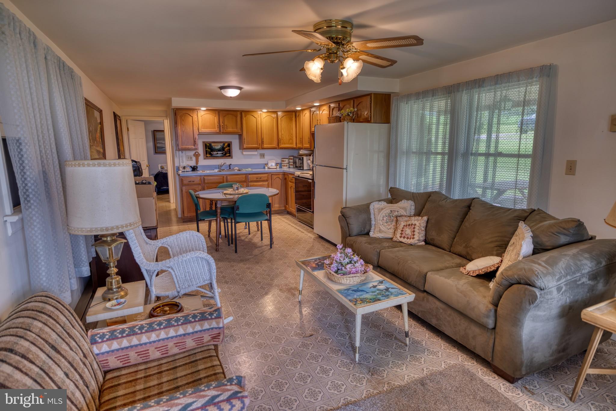 158 C Pleasant View Road Halifax, PA 17032 - Photo 33 of 59 a living room with furniture and a large window