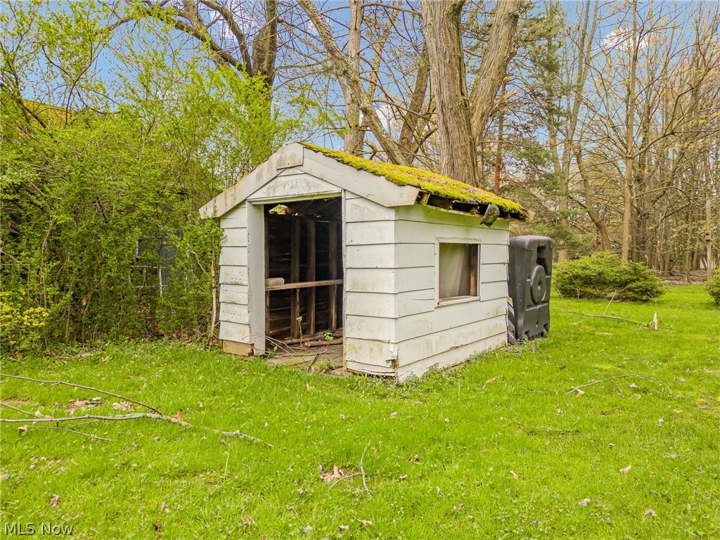 23816 Harms Road Cleveland, OH 44143 - Photo 9 of 11 View of outdoor structure featuring a lawn