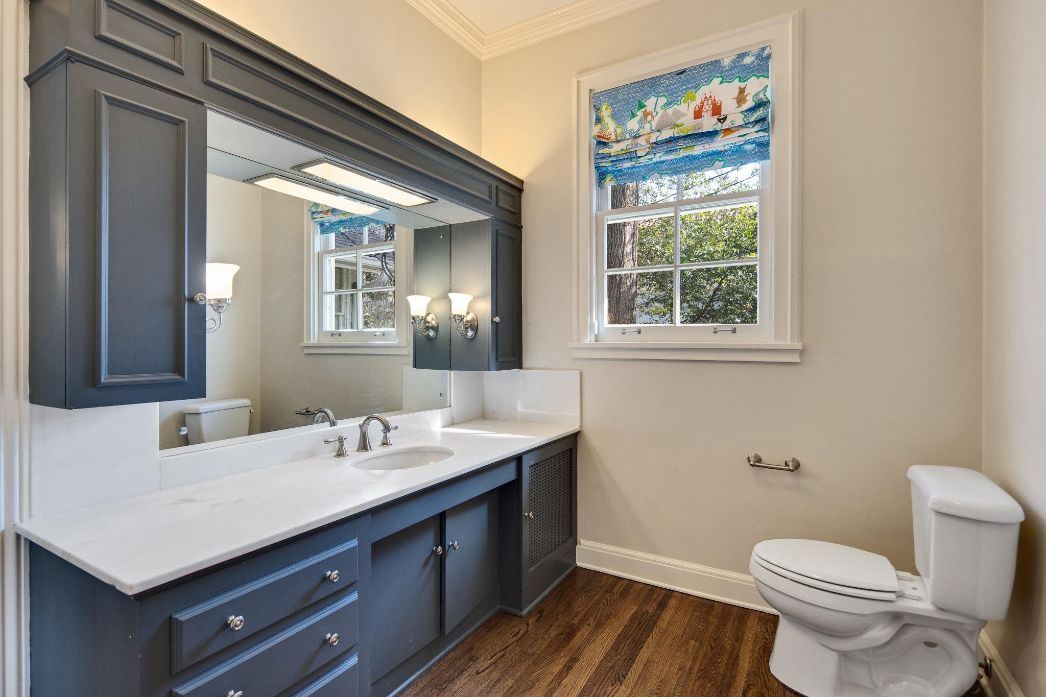 505 Goodwyn Street Memphis, TN 38111 - Photo 24 of 40 a bathroom with a sink a toilet and a window