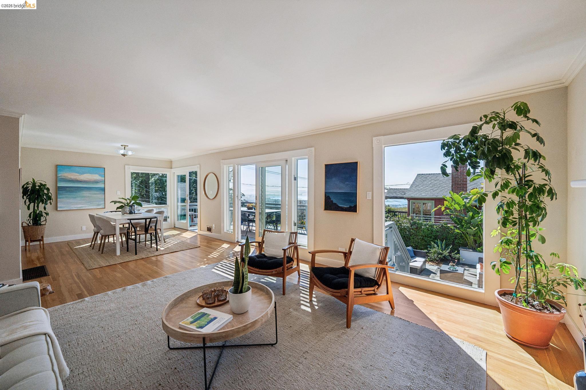 290 Colgate Avenue Kensington, CA 94708 - Photo 13 of 52 Living area with light wood finished floors and ornamental molding