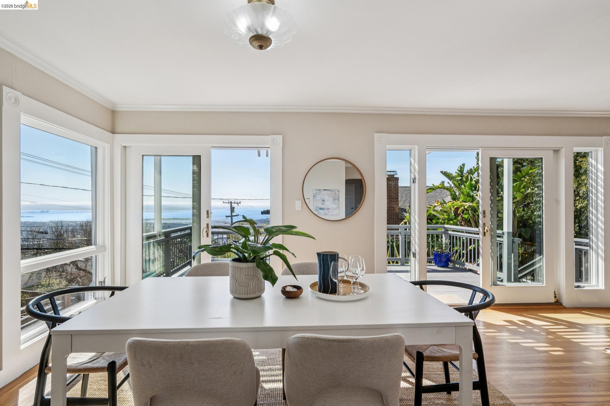 290 Colgate Avenue Kensington, CA 94708 - Photo 18 of 52 Dining area featuring light wood-style flooring and crown molding