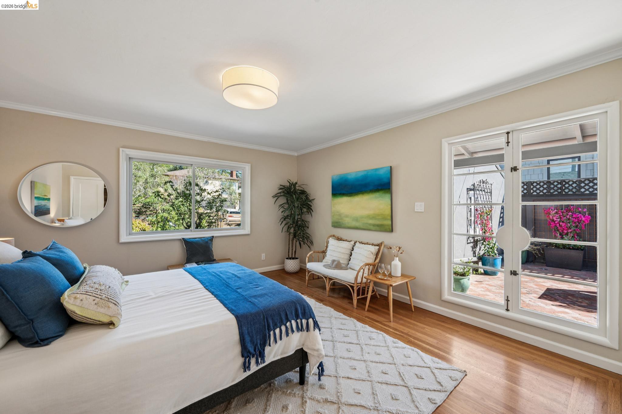 290 Colgate Avenue Kensington, CA 94708 - Photo 33 of 52 Bedroom featuring light wood-style flooring and ornamental molding